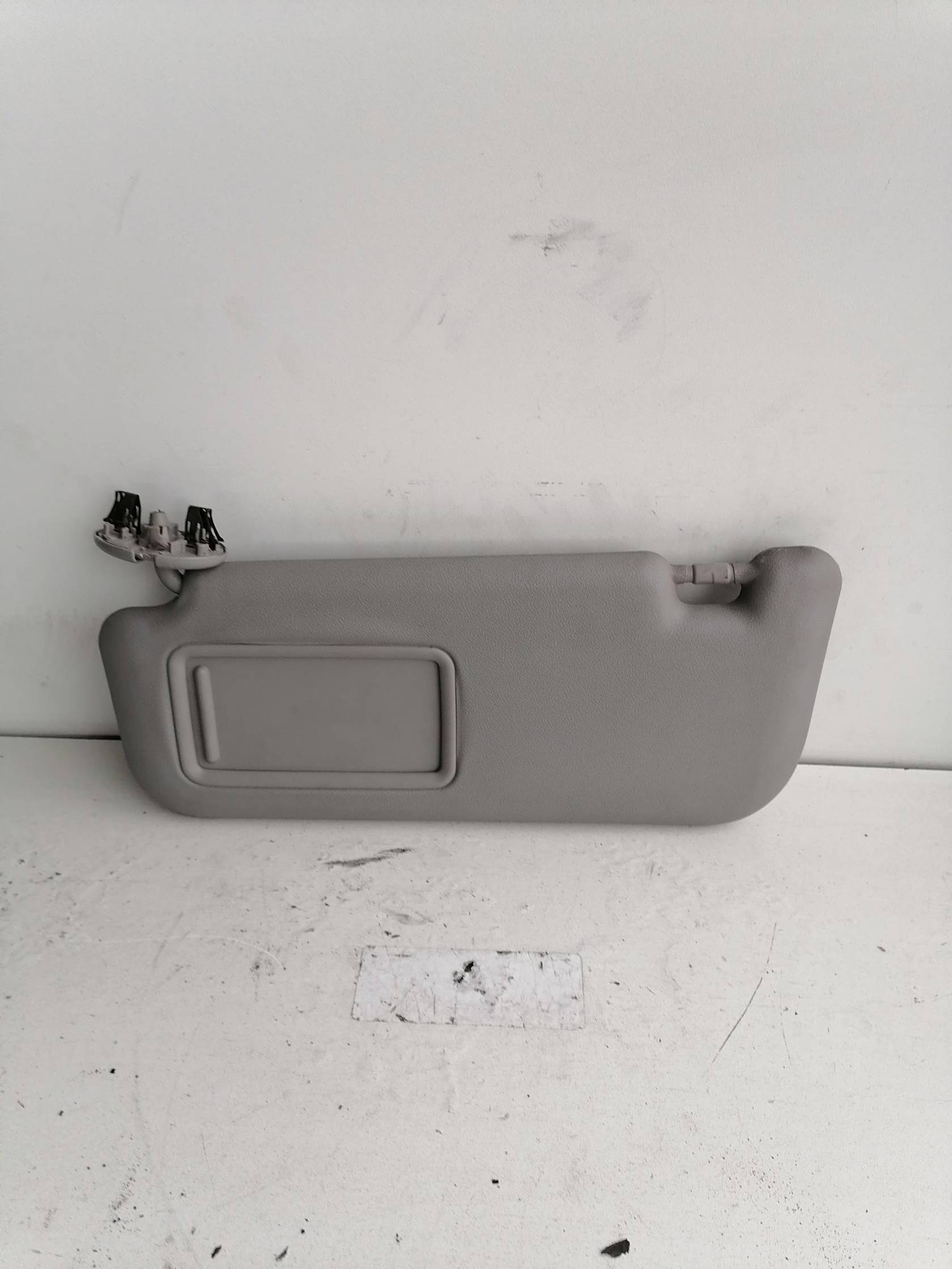 Aletta parasole parabrezza sx.